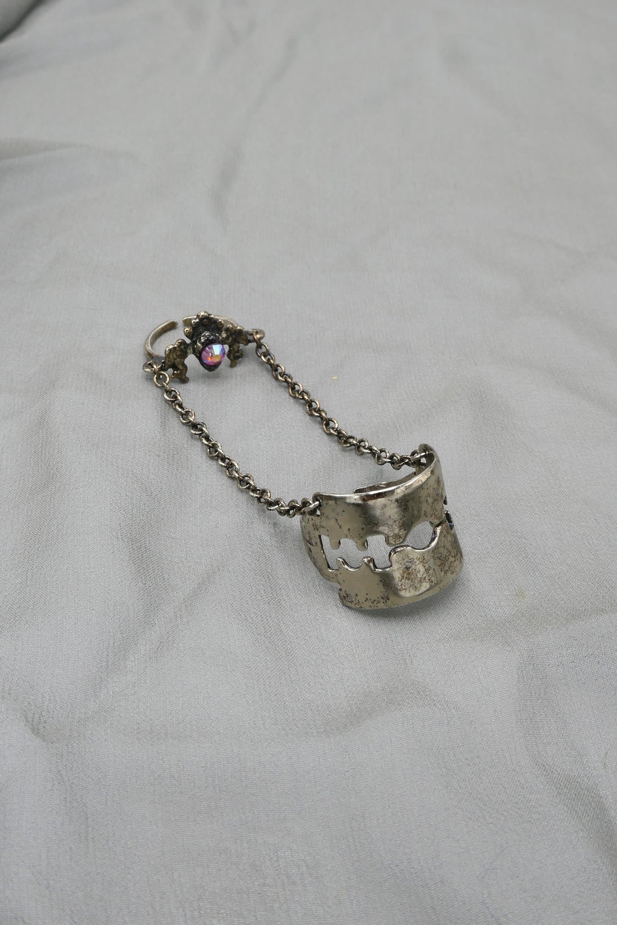 THE RAZOR BLADE AND ANGEL CHAINED RING